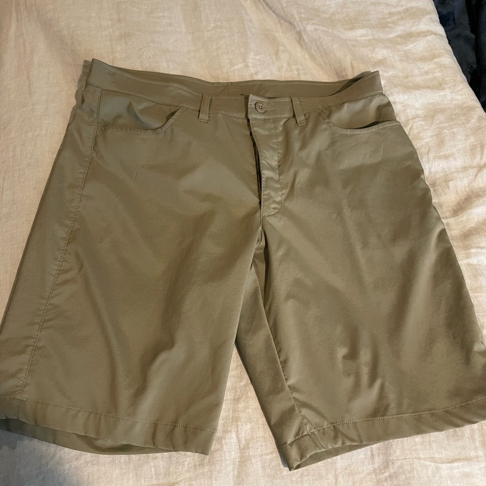 Under Armour shorts. Khaki. Heat gear. Size 38. Inseam 9”.